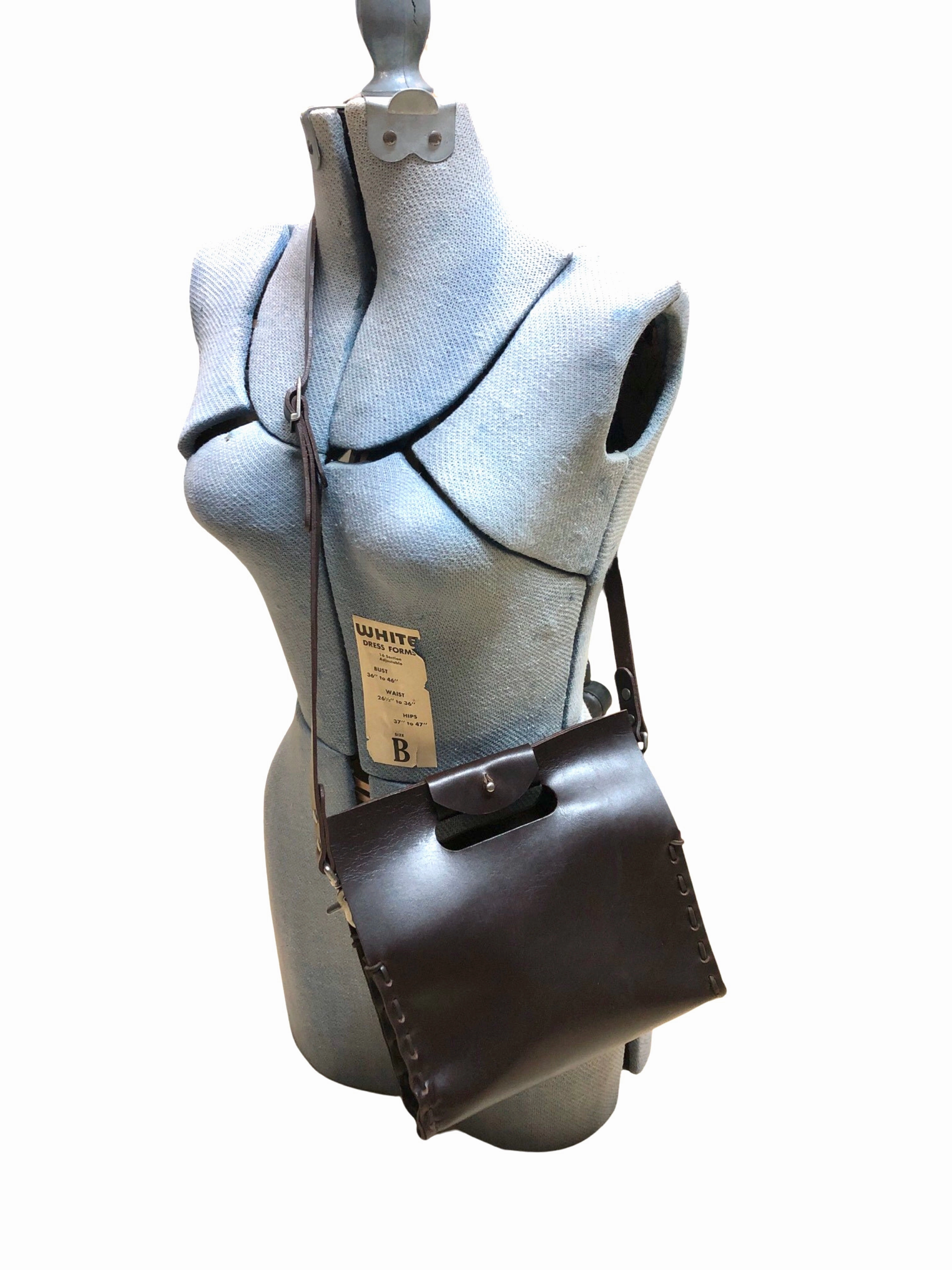B48 whipstitch clutch