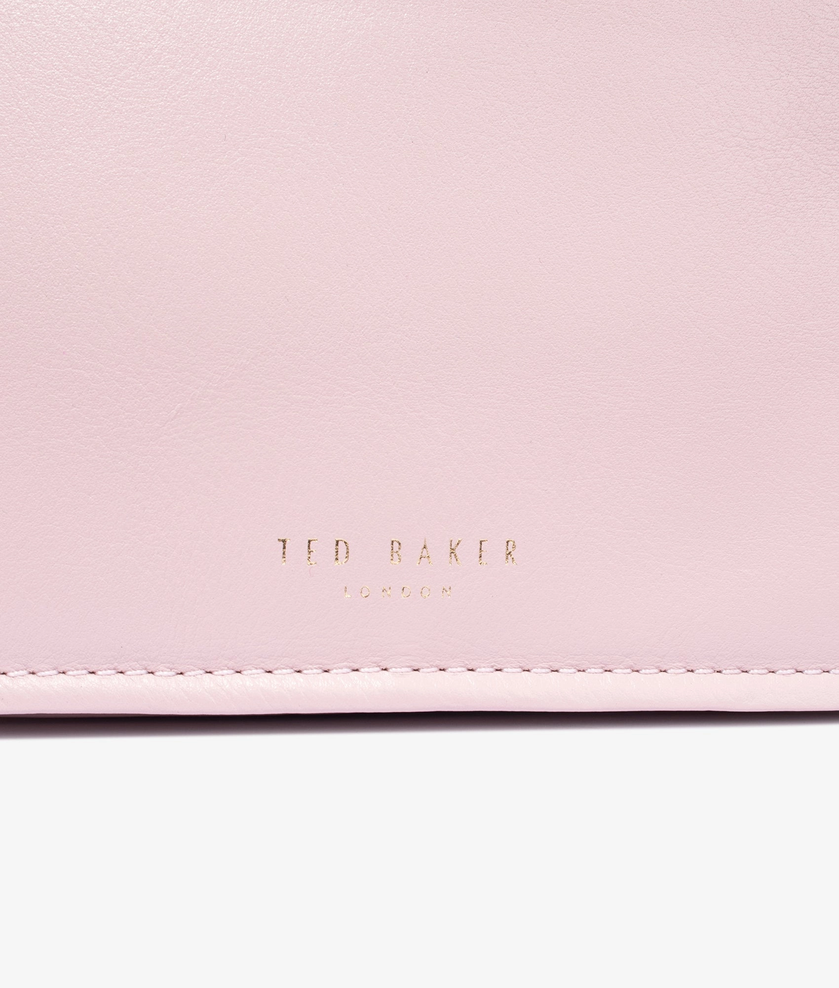 Maryse knotted handle bag in pale pink