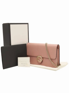 Pink leather interlocking GG chain mini clutch crossbody bag