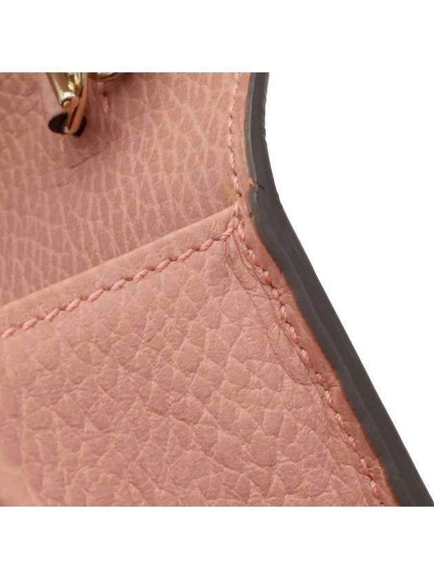 Pink leather interlocking GG chain mini clutch crossbody bag