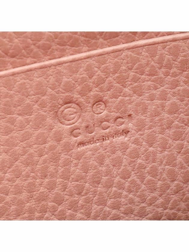 Pink leather interlocking GG chain mini clutch crossbody bag